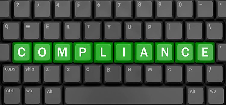 PC-Tastatur mit dem Wort: Compliance