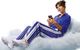 Junge Frau mit Smartphone sitzt auf einer Wolke
