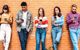 Junge Menschen der Generation Z, alle mit ihrem Handy beschäftigt