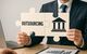 Ein Bankmanager erklärt Oursourcing