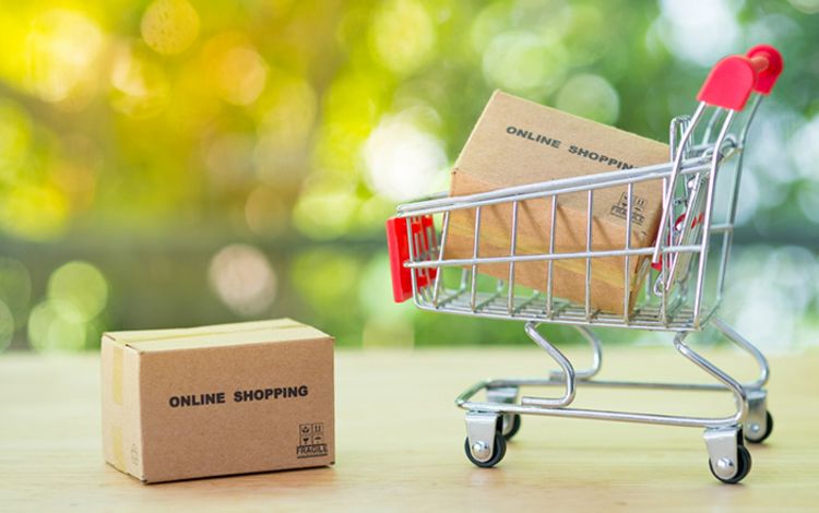 Symbolbild mit Einkaufswagen für Online Shopping