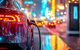 E-Auto bei Nacht, das gerade mit Strom aufgeladen wird
