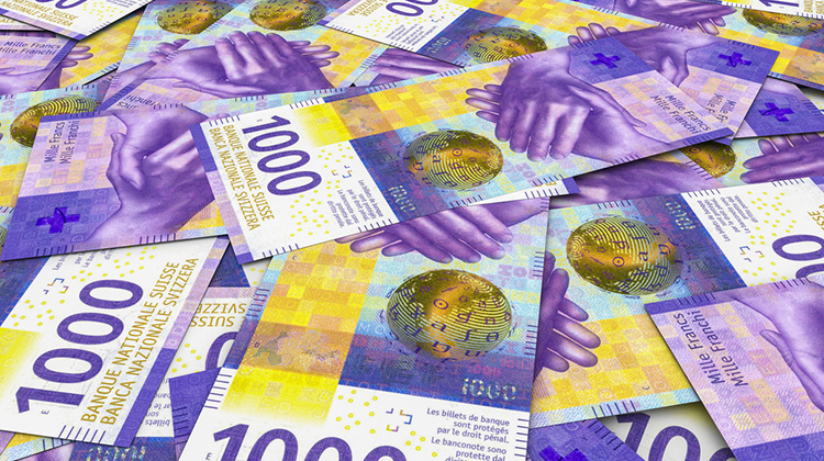 Tausend-Franken-Banknoten bildfüllend ausgelegt