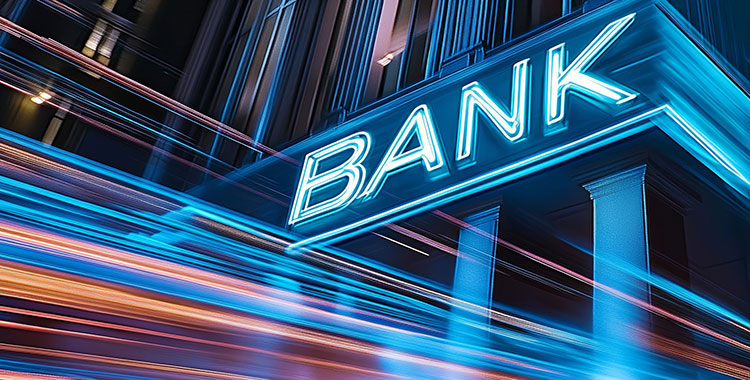 Bank mit Neonschrift als Symbol für die gesamten Banken-Branche