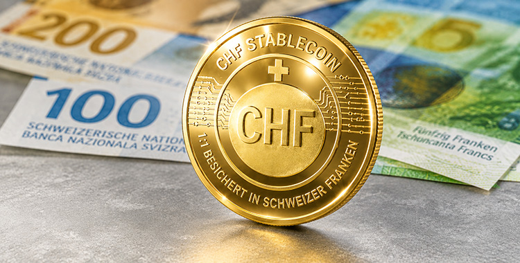 Eine goldfarbene Münze zeigt eine Stablecoin, der mit Schweizer Franken besichert ist